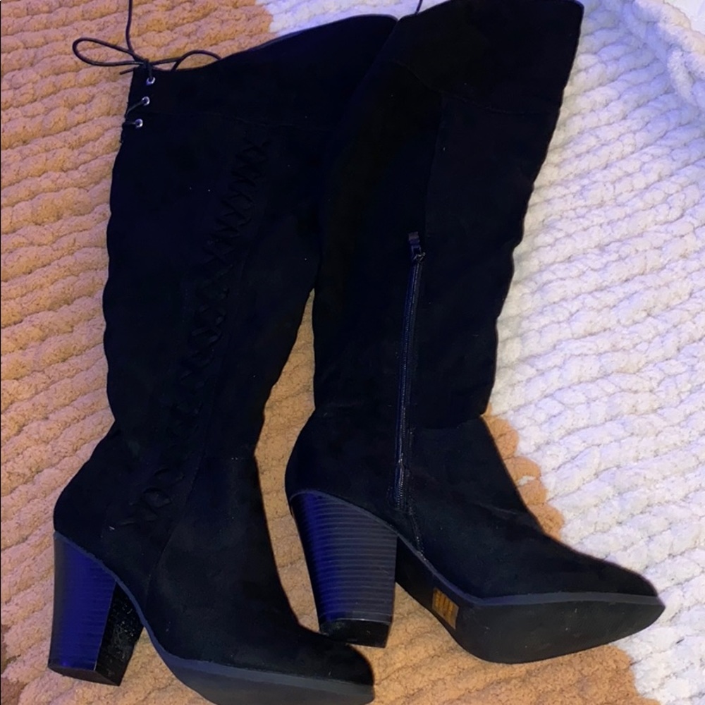 Knee high heeled boots